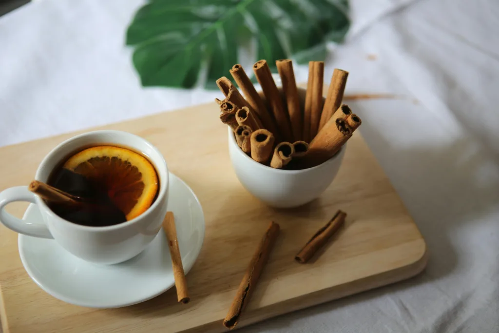 Cinnamon with cup of tea